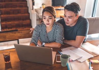 Couple watching video on laptop
